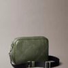 Allover Embossed Emblem Logo Camera Bag