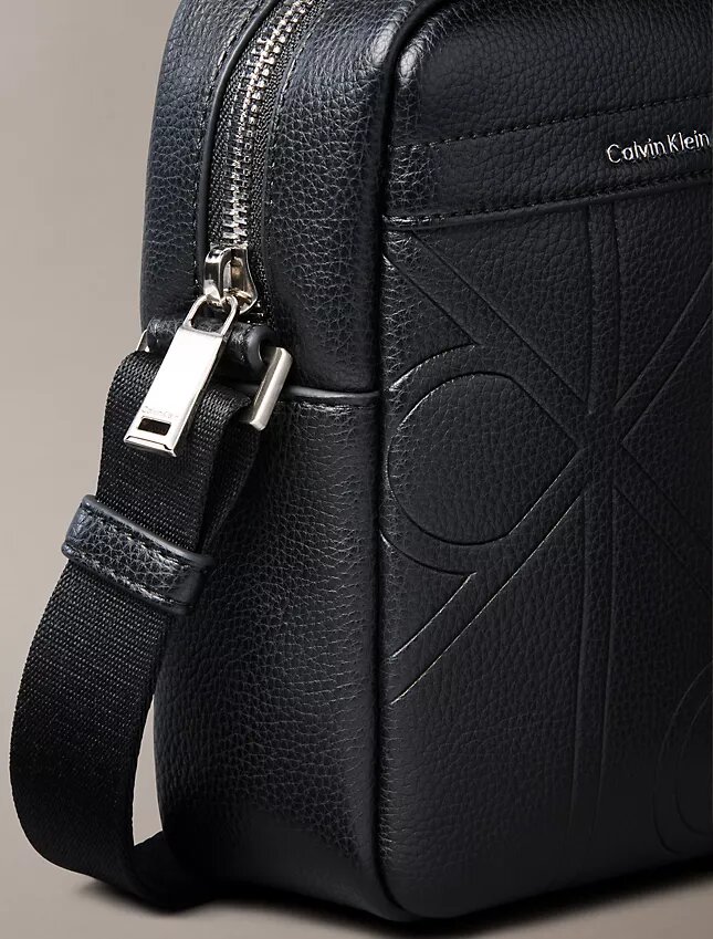 Allover Embossed Emblem Logo Slim Reporter Bag Allover Embossed Emblem Logo Slim Reporter Bag